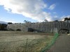 石巻市門脇小学校(保存か解体かでゆれている。防護シートで覆われています。)